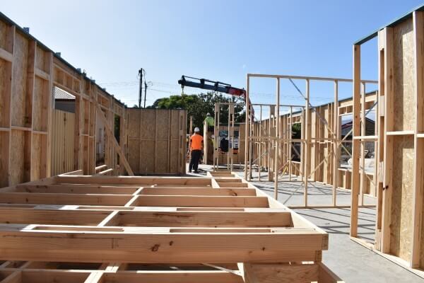 Day 1 Wall frames are craned into position